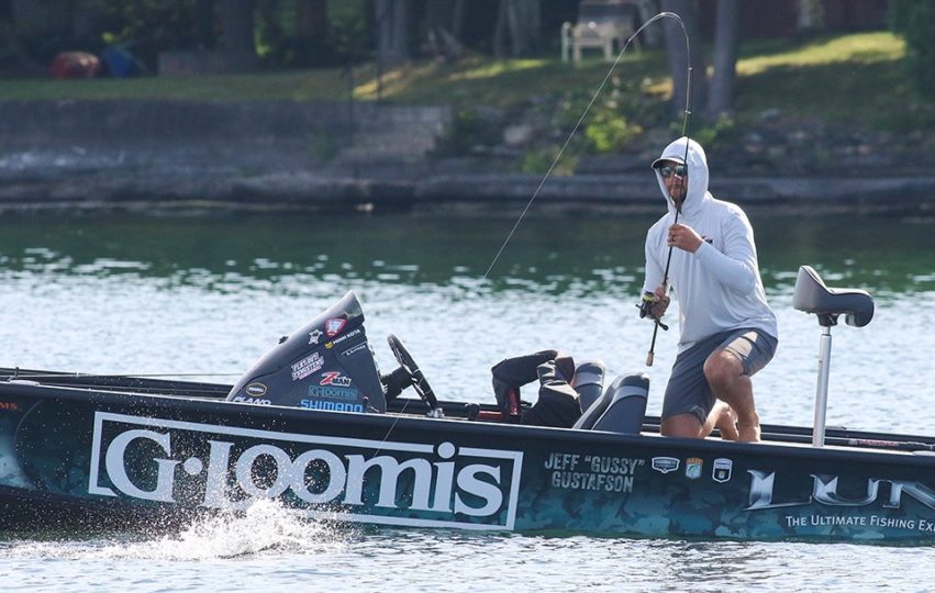 Man fishes from boat