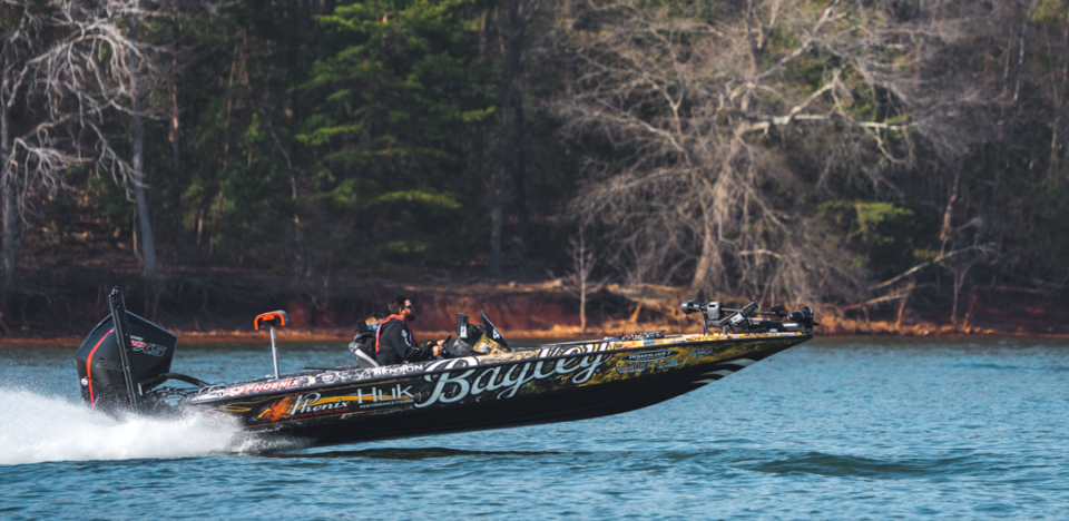 Drew Benton driving his boat at the Bassmaster Classic on Lake Hartwell.