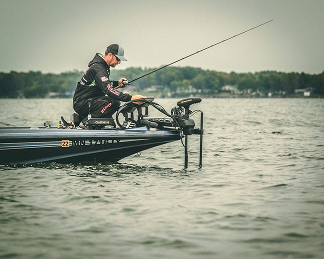 Noah Schultz looking at his sonar while fishing a Champions Tour event