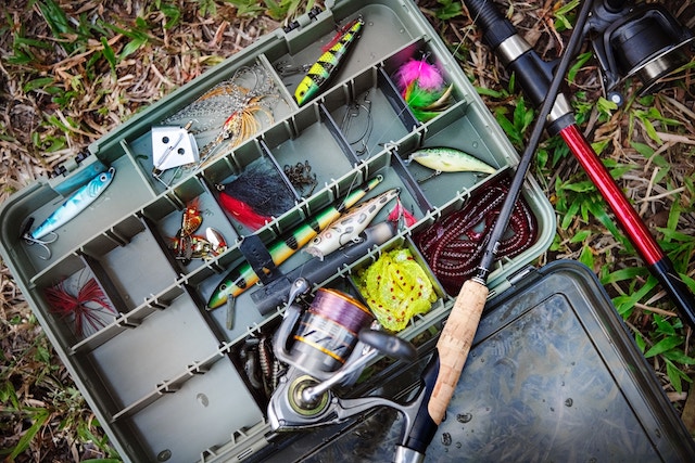 tackle box filled with lures and supplies